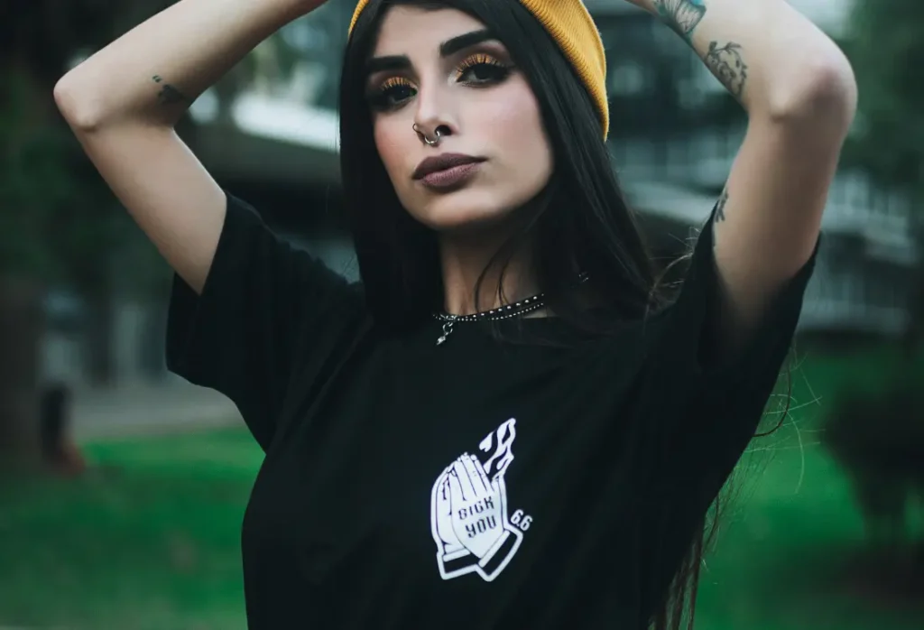 Black printed T-shirt with a centre chest graphic, offering inspiration for bold T-shirt design and logo placement.