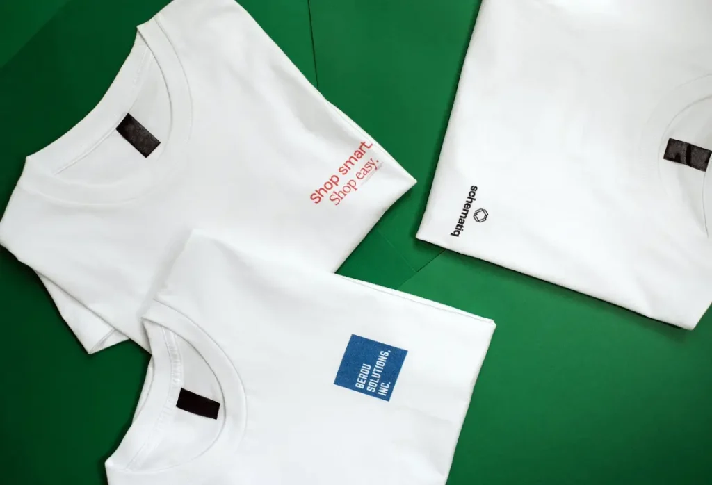 White printed T-shirts showing different T-shirt logo placement options for custom branded T-shirt design.