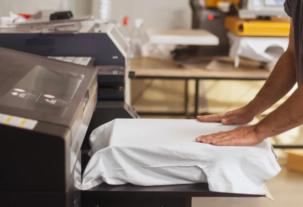 White premium T-shirt being prepared for a custom T-shirt printing order.