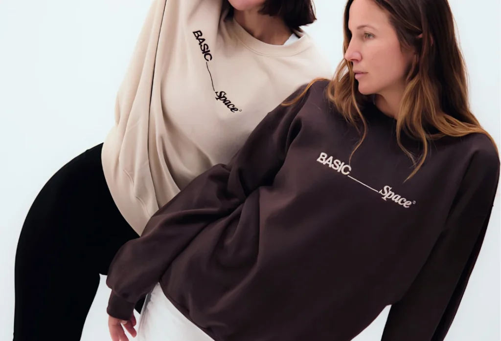 Custom embroidered Basic Space sweatshirts produced by ICON Printing on durable poly cotton blend that absords moisture and is comfortable for athletic wear.