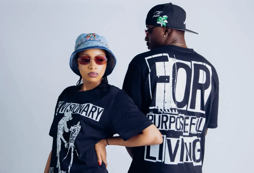 Gen Z style with oversized graphic T-shirts, bold custom prints and a denim bucket hat.