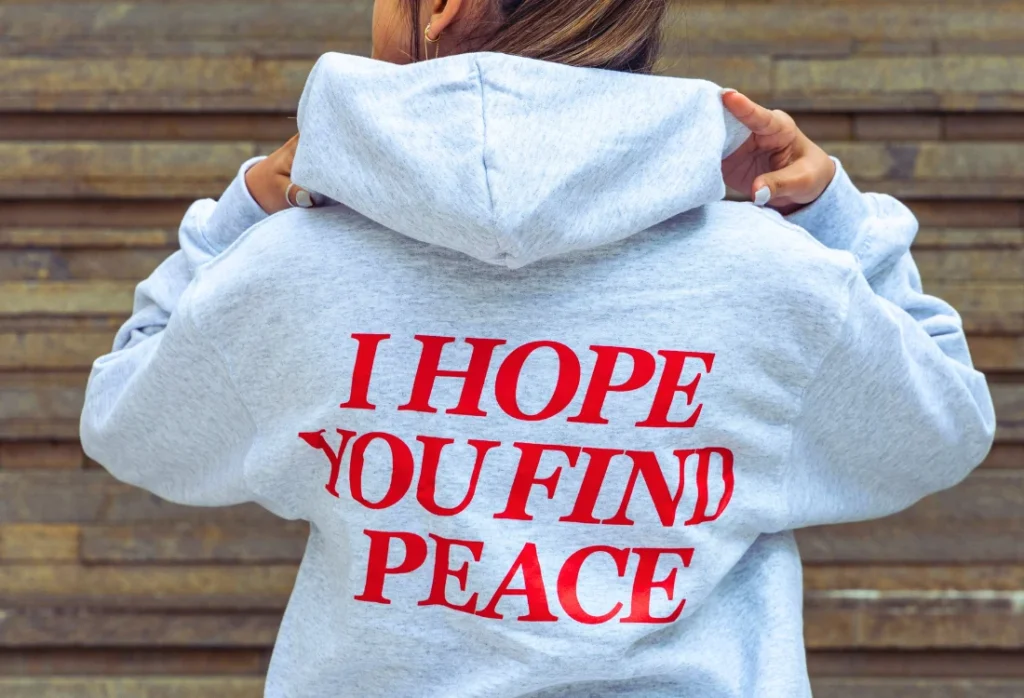 Custom printed heavyweight and wrinkle resistant cotton hoodie with red back print suitable for most personal styles.